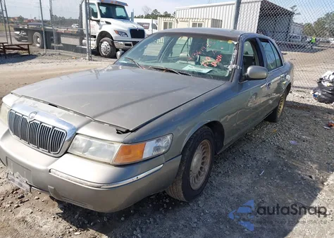 1998 Mercury Grand Marquis z USA, uszkodzony, nr VIN 2MEFM75W1WX684957